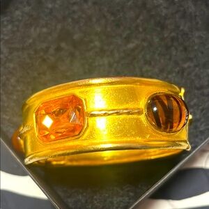 Cuff bracelet Gold tone metal with 3 stones. 1980’s  hinge closure